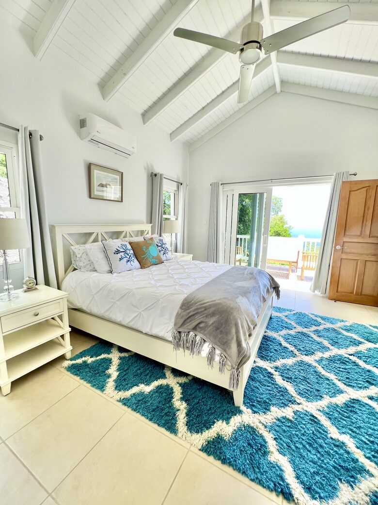 Guest Room suite with ocean views and private balcony.