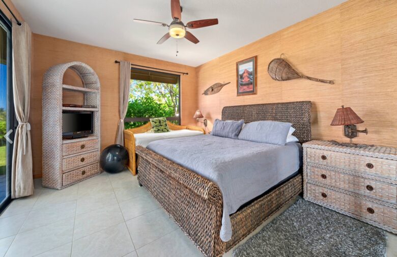 Master bedroom with king bed and extra day bed