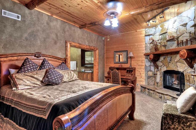 Home Exchange in Big Bear Lake, CA master bedroom with fireplace