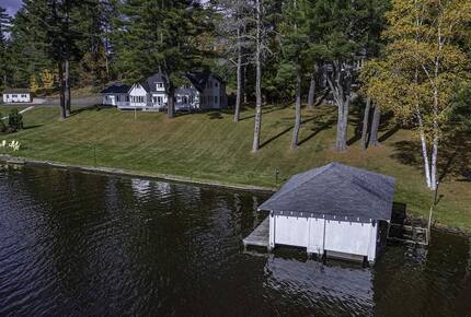 Home Exchange in Eagle River, WI lake with boat house
