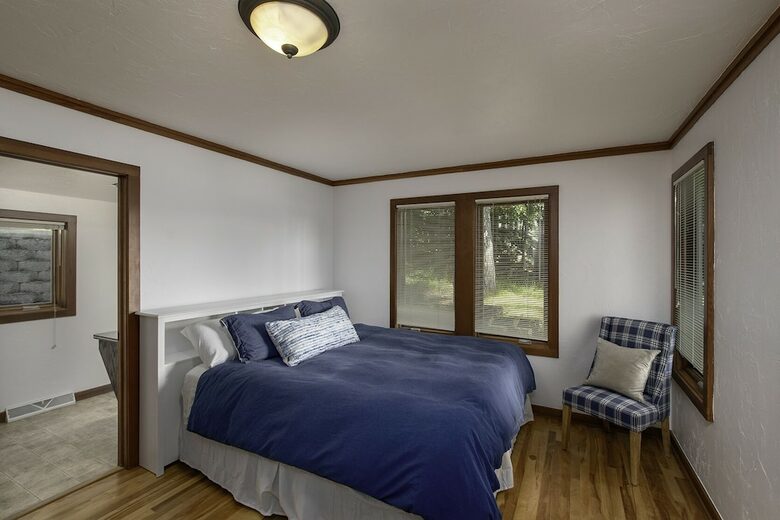 Home Exchange in Eagle River, WI master suite Castaway with king bed
