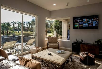 Home Exchange in La Quinta, CA living room with television