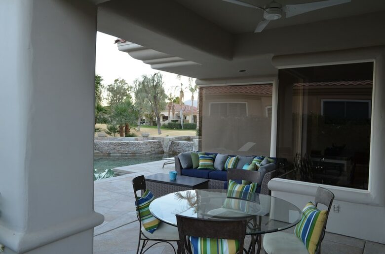 Home Exchange in La Quinta, CA outdoor dining and lounge