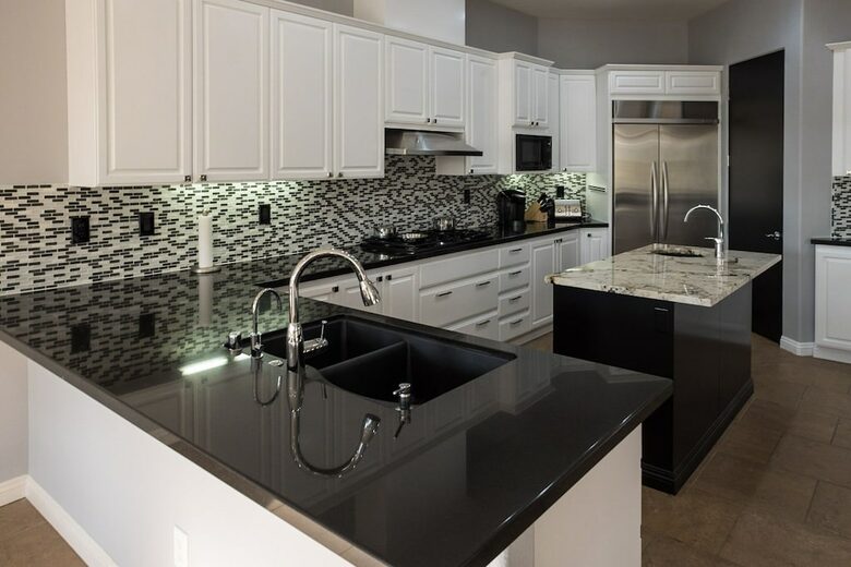 Home Exchange in La Quinta, CA kitchen with stainless steel appliances