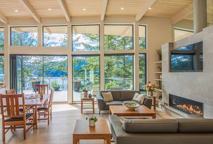 Open living room with fireplace and stunning views