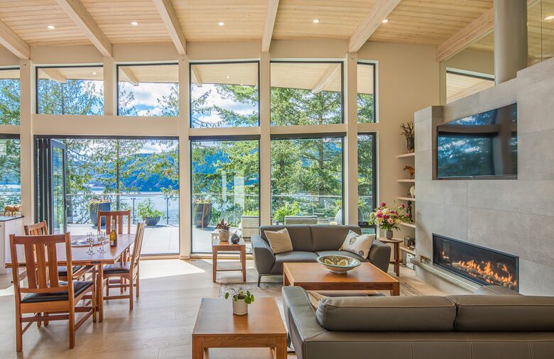 Open living room with fireplace and stunning views