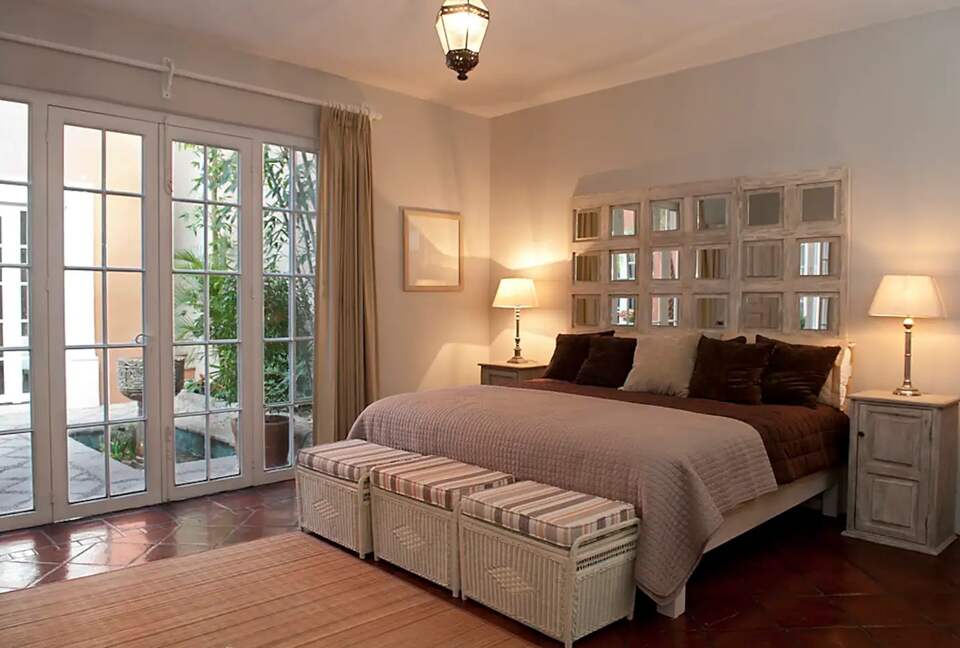 Home Exchange in San Miguel de Allende master bedroom with king bed