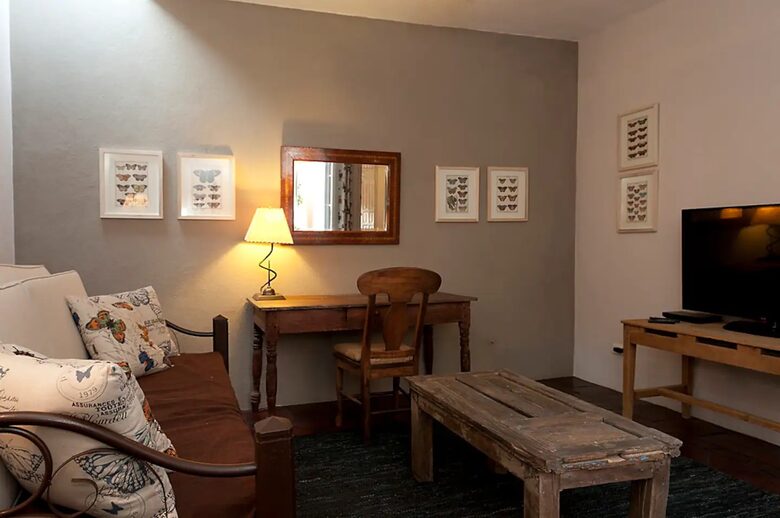 Home Exchange in San Miguel de Allende den with office space and tv