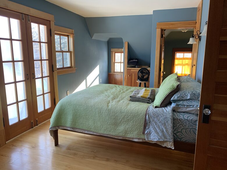 Primary Bedroom with half bath