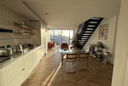 kitchen, living and steps to roof terrace