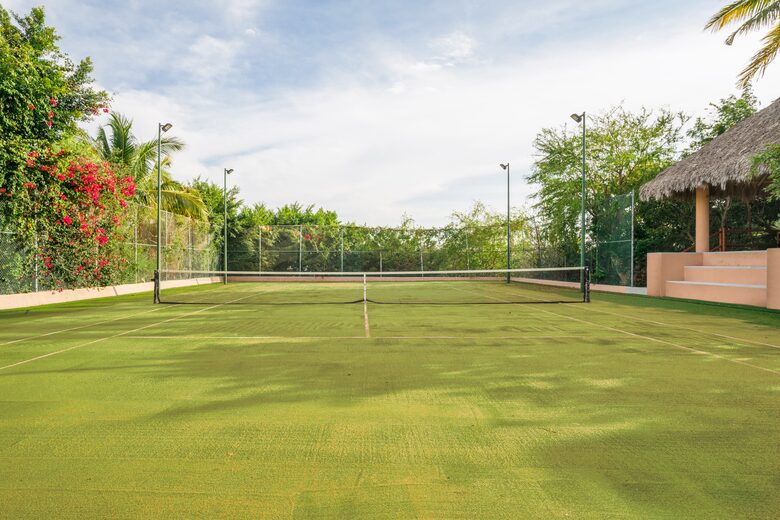 Private tennis court with lights