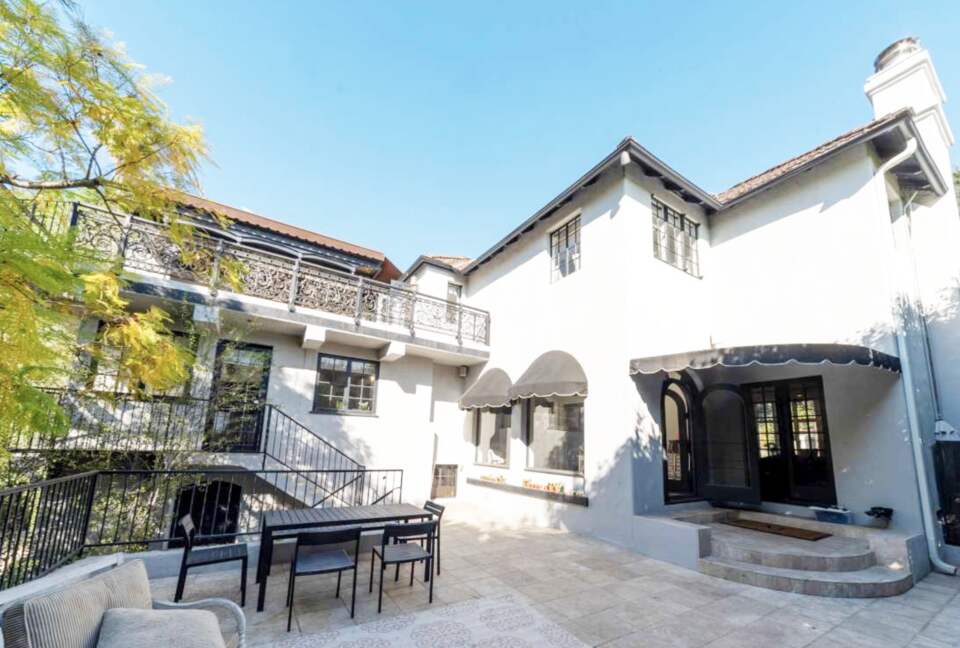 Large patio with dining & sitting areas off of living and family rooms