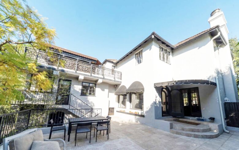 Large patio with dining & sitting areas off of living and family rooms