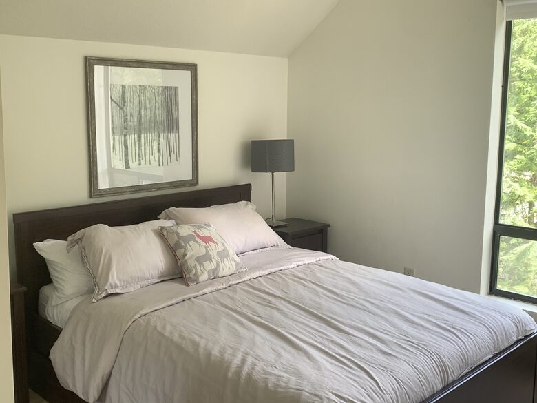 Upstairs bedroom with queen