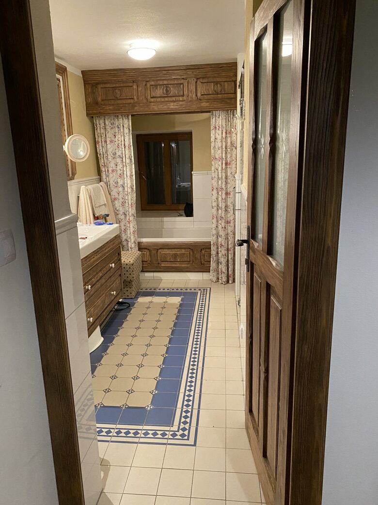 Downstairs bathroom with traditional stone tiles