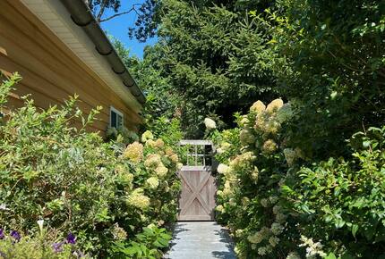 Entry pathway from driveway to main house back deck