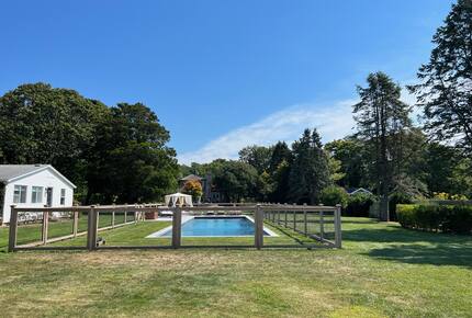 View of the pool, cottage and main house
