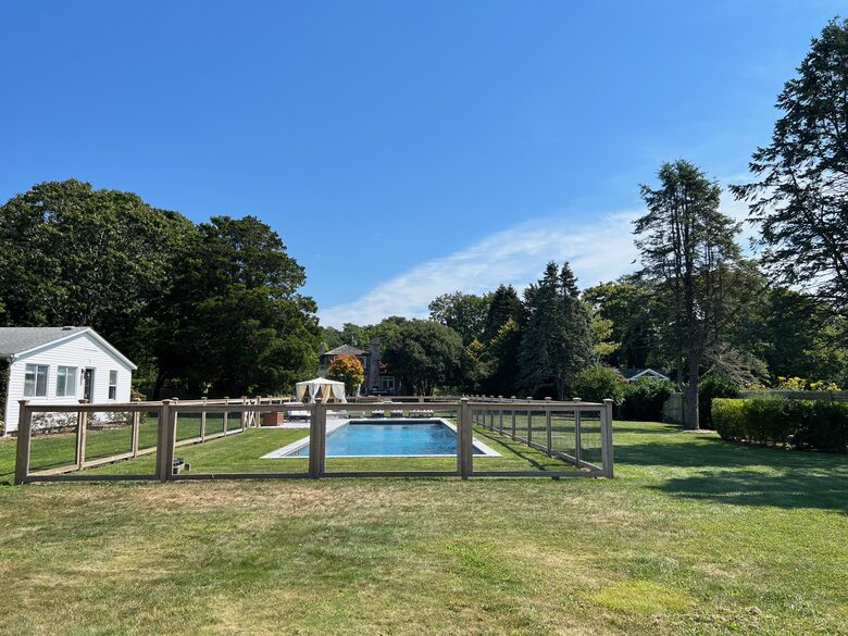 View of the pool, cottage and main house