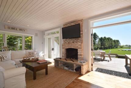 Main house living room and outdoor dining area