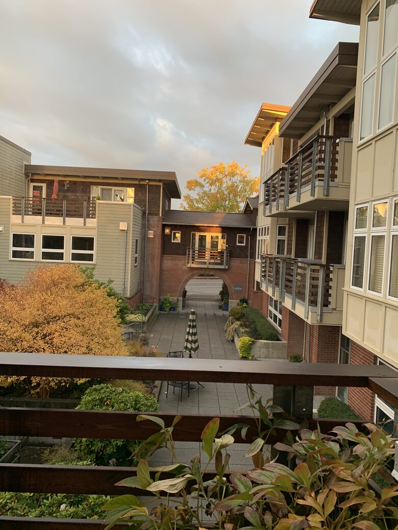 view of courtyard leading to Winslow Way from balcony