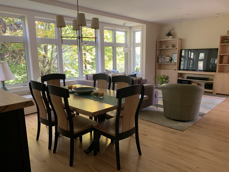 great room with dining, living room and large tv