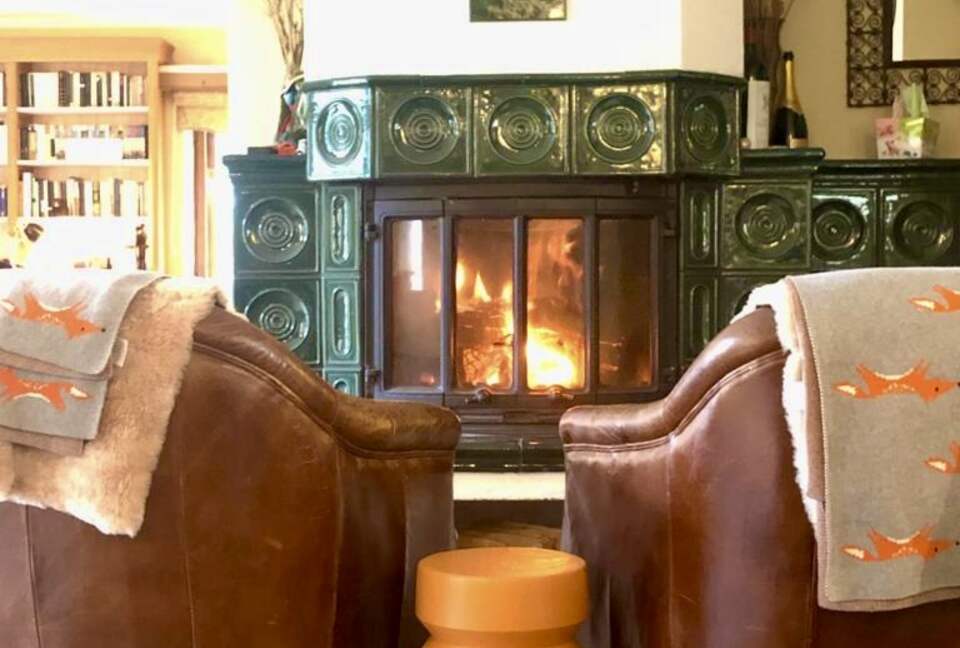 Out traditional Czech tiled fireplace