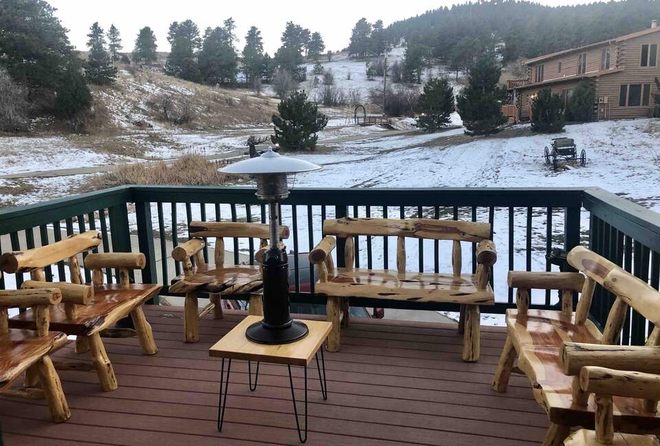 View off of Barn Deck looking up to log cabin