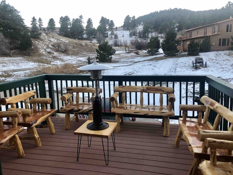 View off of Barn Deck looking up to log cabin