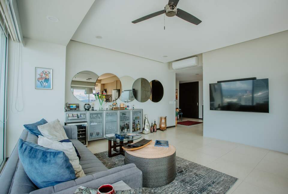 Unique interior design with mirror bringing the ocean into the house