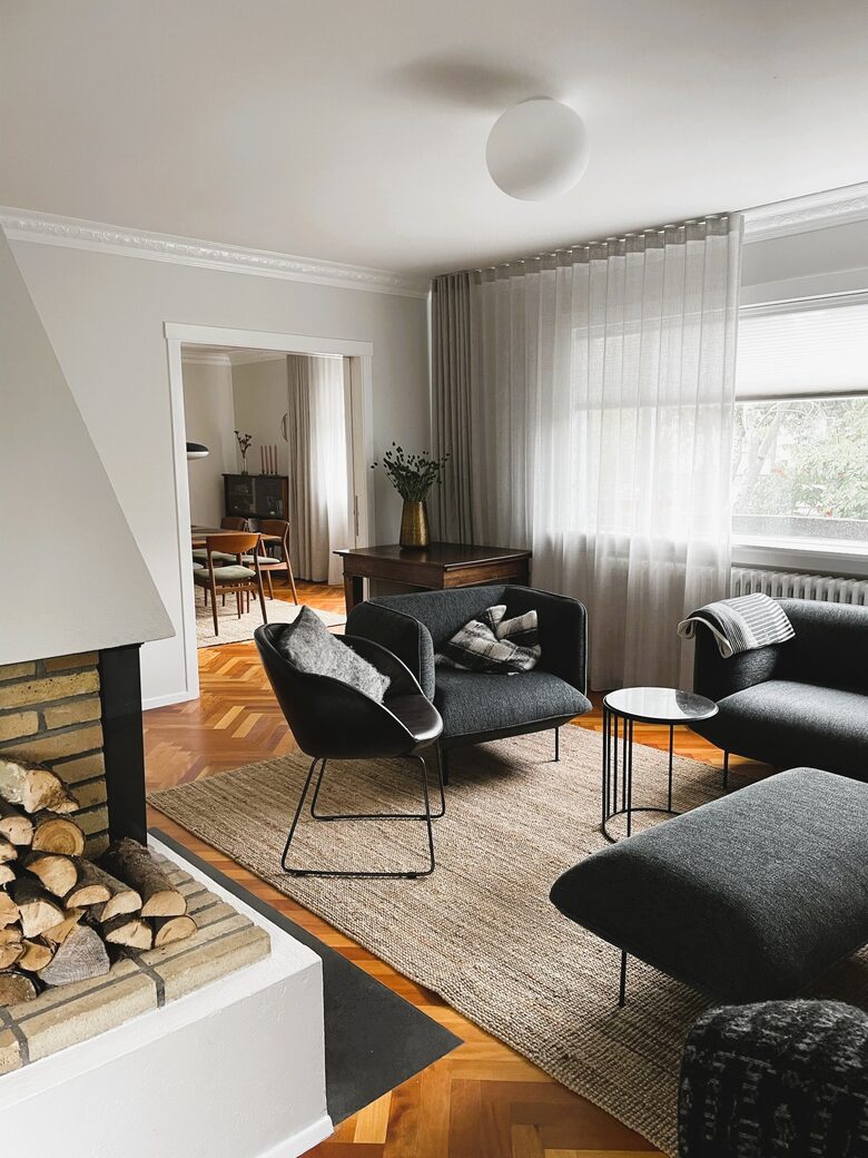 Open living/dining area with a fireplace