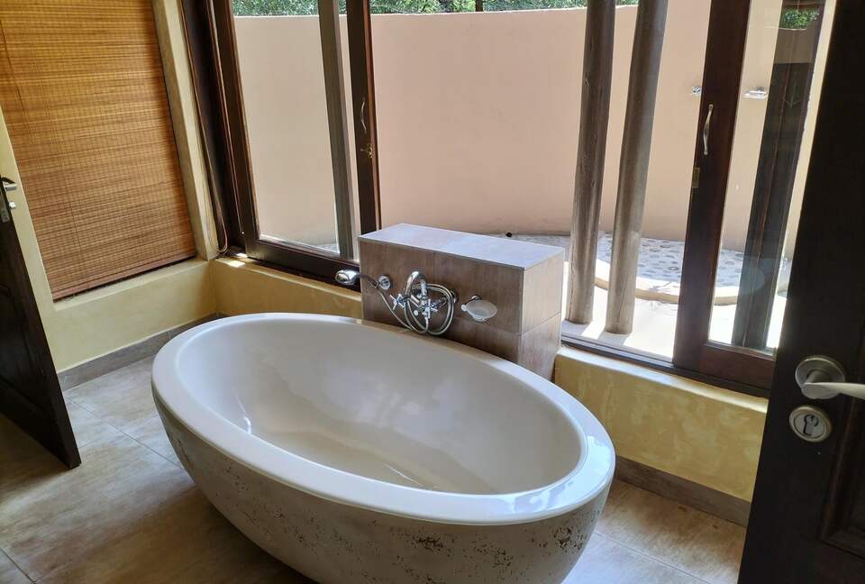 Bathrooms with bath and shower