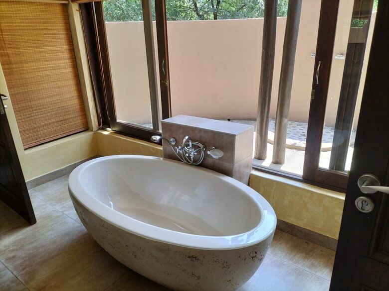 Bathrooms with bath and shower