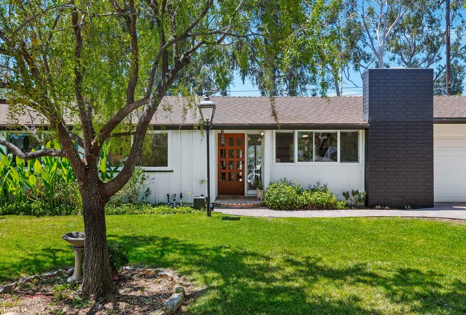 exterior house entry with antique lantern from Scotland