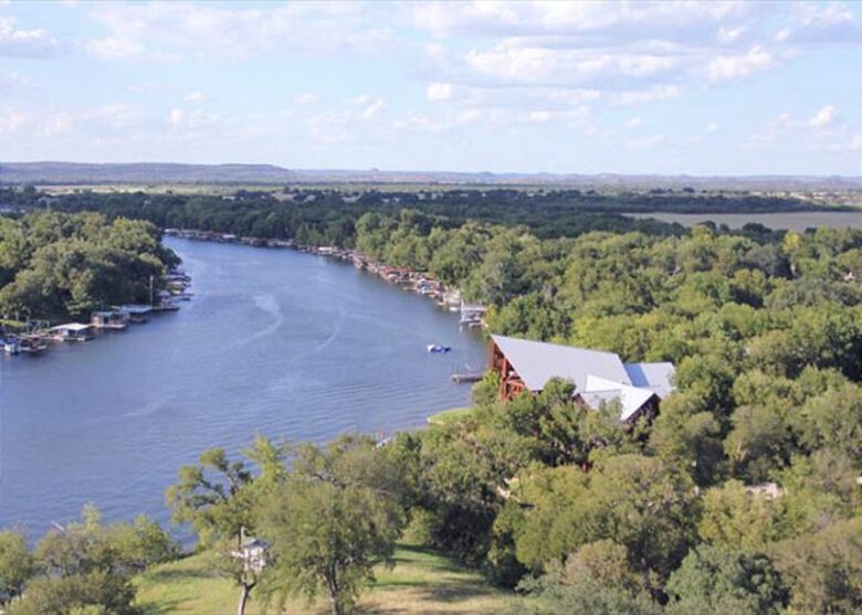 Lakefront Log Home with Large Lagoon Pool and Hot tub | Sleeps 35 - Burnet, Texas