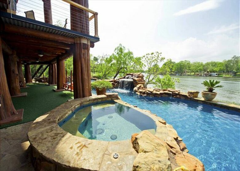 Lakefront Log Home with Large Lagoon Pool and Hot tub | Sleeps 35 - Burnet, Texas