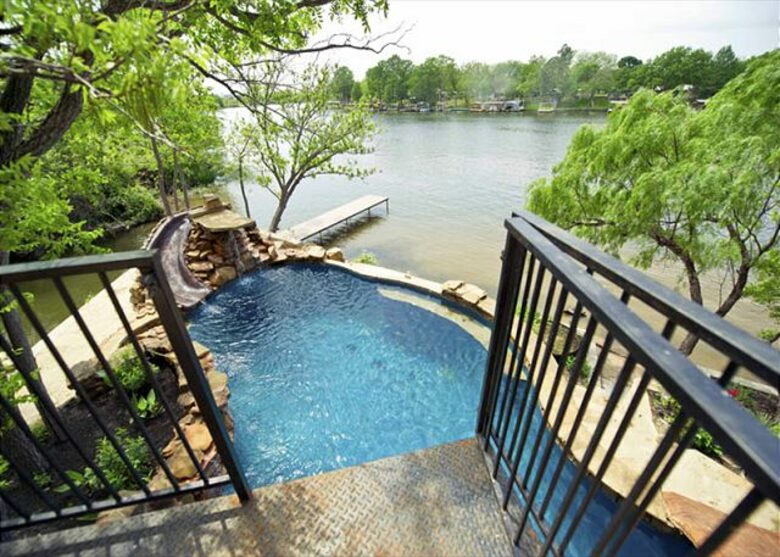 Lakefront Log Home with Large Lagoon Pool and Hot tub | Sleeps 35 - Burnet, Texas