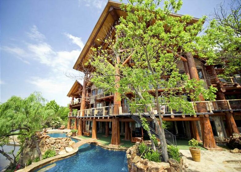 Lakefront Log Home with Large Lagoon Pool and Hot tub | Sleeps 35 - Burnet, Texas