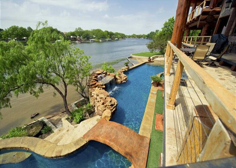 Lakefront Log Home with Large Lagoon Pool and Hot tub | Sleeps 35 - Burnet, Texas