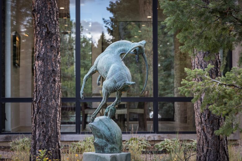 Gazelle sculpture outside dining room windows.