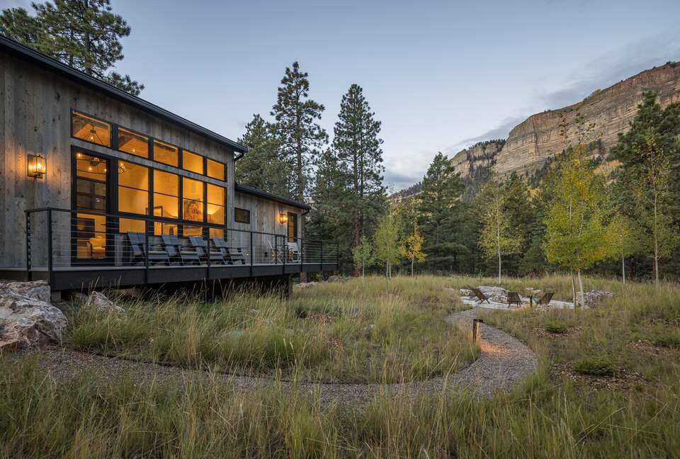 Living room & Guest room wing overlooking firepit.
