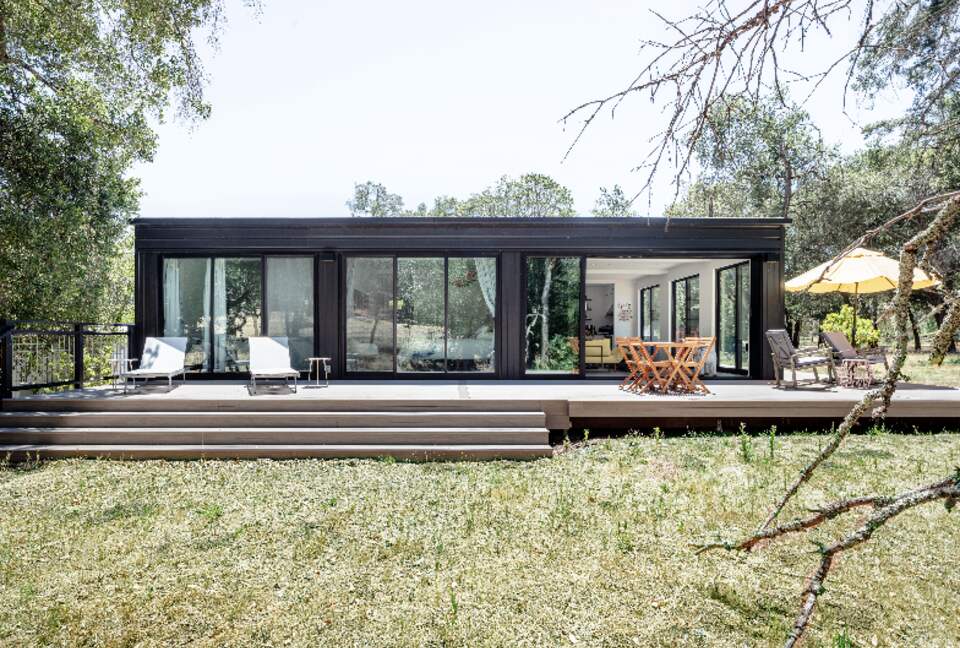 The smaller, second house