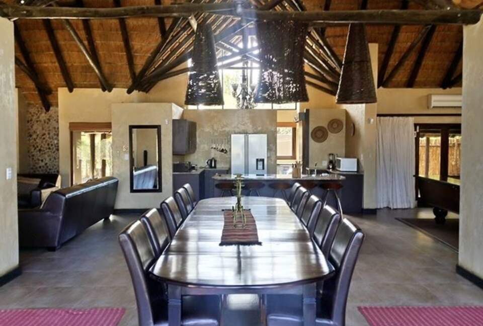 Dining area and kitchen at the far end