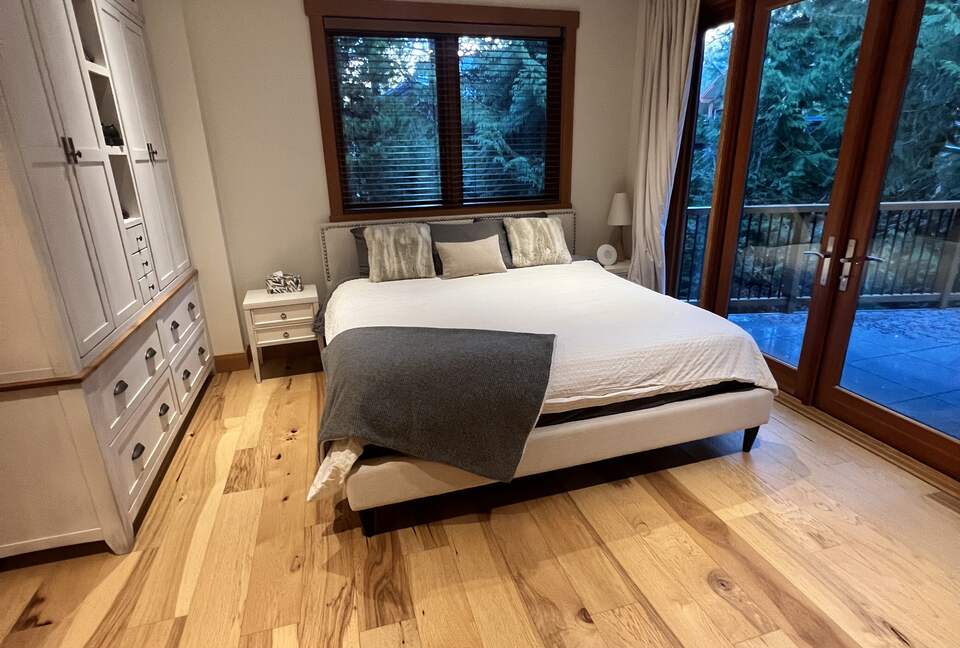 Master Bedroom with French doors out to private outdoor deck area