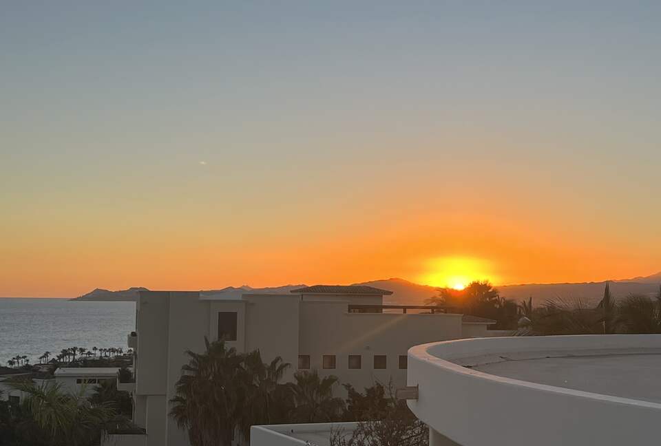 sunset view from rooftop deck