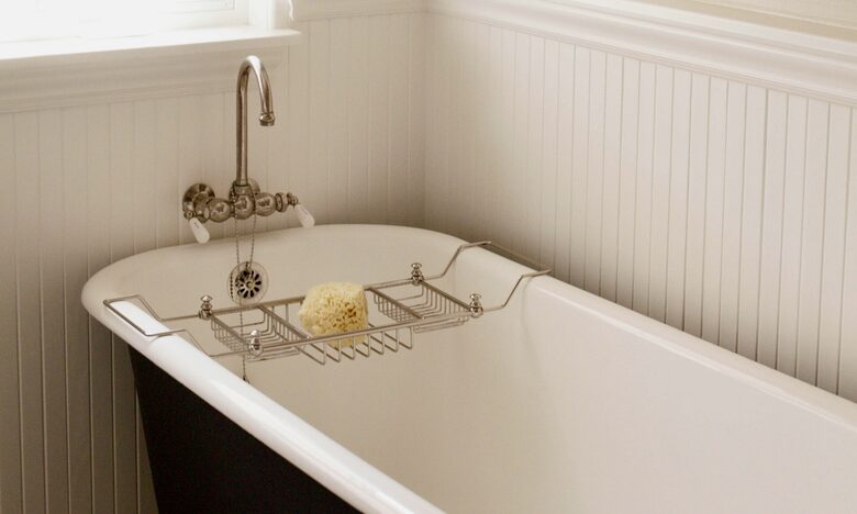 Hall bath with clawfoot tub and separate shower