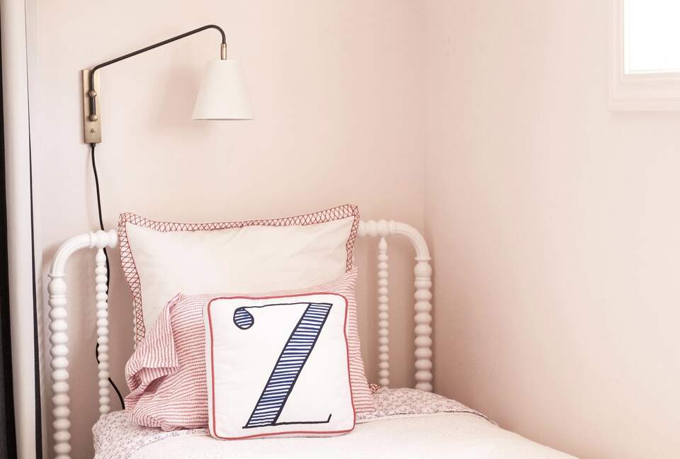 Children's bedroom with two twin trundle beds