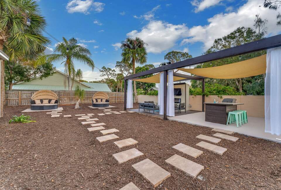 Grand Florida Estate with Heated Pool and Backyard Oasis - Merritt Island, Florida