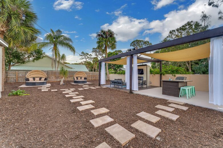 Grand Florida Estate with Heated Pool and Backyard Oasis - Merritt Island, Florida