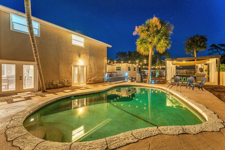 Grand Florida Estate with Heated Pool and Backyard Oasis - Merritt Island, Florida