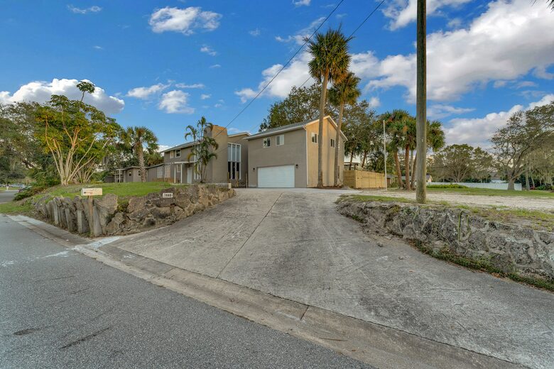 Grand Florida Estate with Heated Pool and Backyard Oasis - Merritt Island, Florida